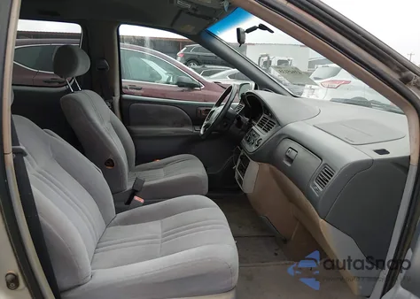 2002 Toyota Sienna из США, поврежденный, VIN 4TZ3F13C52U457631